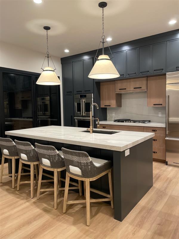 Theodore Coastal Beach Woven Grey Upholstered Brown Mahogany Frame Counter Stool Image 1